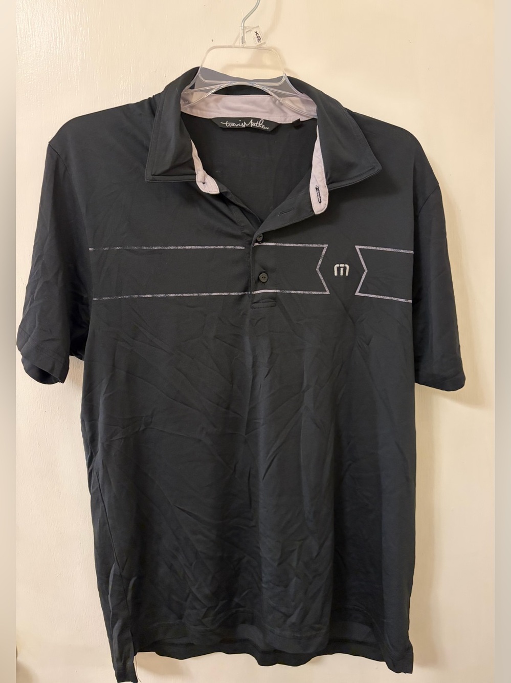 Travis Mathew Black Polo with Light Gray Contrast Trim